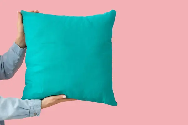 stock image Woman with bright blue pillow on pink background