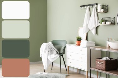 Şık bir banyo, sandalye, göğüs ve lavabo. Farklı renk desenleri