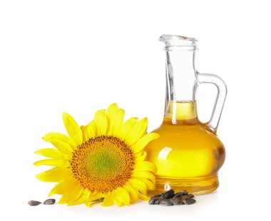 Beyaz arkaplanda ayçiçeği yağı ve tohumlarının dekanı