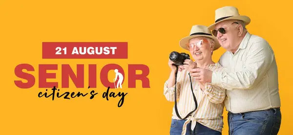 stock image Banner for National Senior Citizens Day with happy mature couple holding photo camera