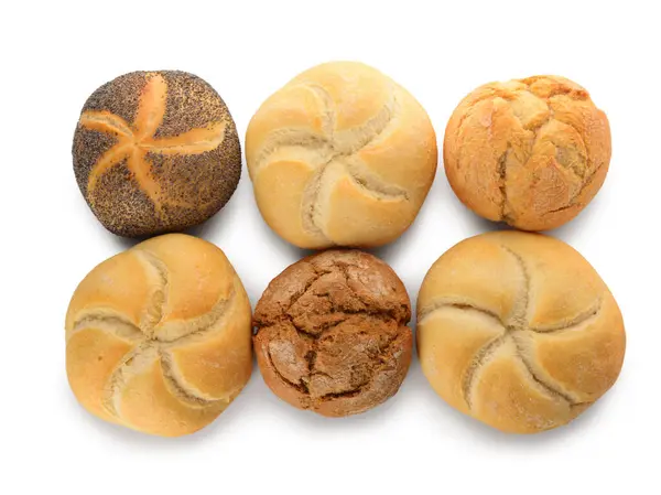 stock image Different delicious buns on white background