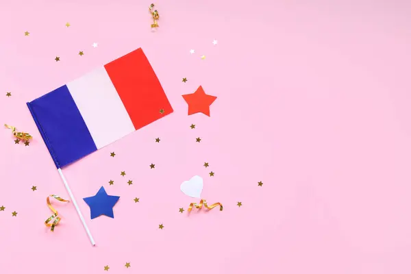 stock image Flag of France with stars and confetti on pink background. Bastille Day celebration