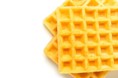 Beyaz arka planda lezzetli Belçika waffle 'ları. Üst görünüm