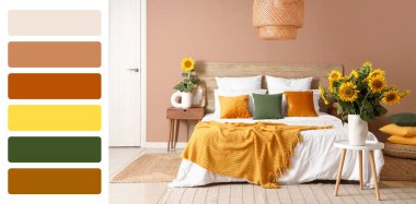 Büyük yataklı ve vazolarında ayçiçekleri olan şık bir yatak odası. Farklı renk desenleri