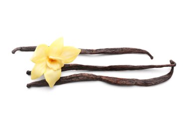 Güzel sarı vanilya çiçeği ve beyaz arka planda çubuklar.