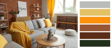 Gri kanepesi ve masası olan oturma odasının içinde. Farklı renk desenleri