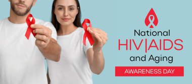 Ulusal HIV AIDS ve Yaşlanma Farkındalığı Günü 'nde genç çiftler kurdele taşıyor.