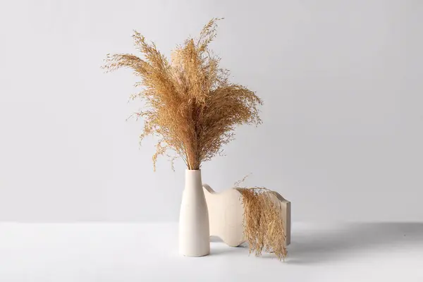 stock image Vase with dry reeds and plaster decor on white background