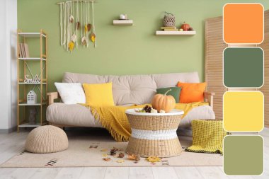 Oturma odasının içinde sonbahar dekoru olan rahat bir kanepe ve masa. Farklı renk desenleri