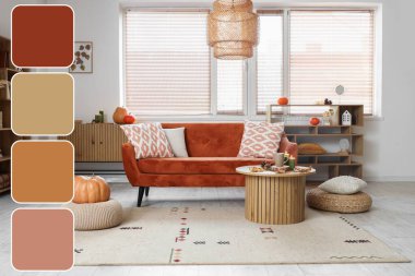 Sonbahar dekoru, kanepesi ve masası olan bir oturma odası. Farklı renk desenleri