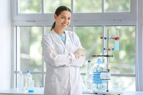 stock image Happy female young scientist in research laboratory. World Water Monitoring Day