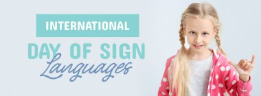 Banner for International Day of Sign Languages with little deaf mute girl clipart