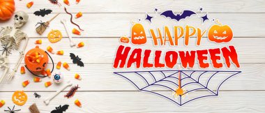 Beyaz ahşap arka planda farklı süslemeleri ve tatlıları olan Cadılar Bayramı afişi