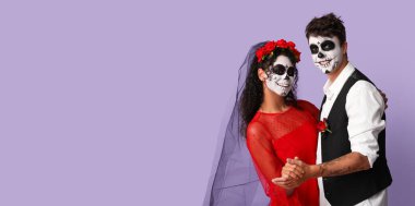 Meksika Ölüler Günü (El Dia de Muertos) için giyinmiş dans eden genç çift.