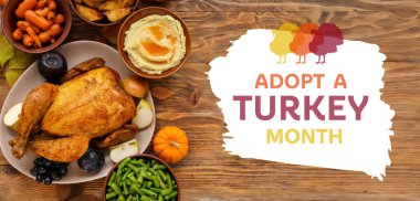 Ahşap arka planda Şükran Günü için lezzetli hindili şenlik yemekleri. Türkiye 'yi Evlat Edinme Ayının Sancağı