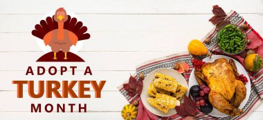 Şükran Günü için beyaz ahşap arka planda şenlik yemekleri. Türkiye 'yi Evlat Edinme Ayının Sancağı