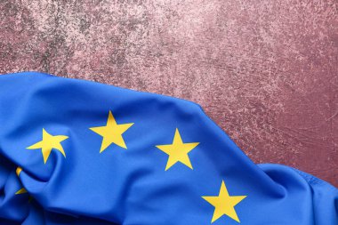 Flag of European Union on grunge pink background