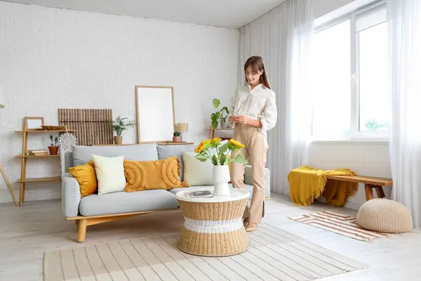 stock image Pretty young woman with phone  at home