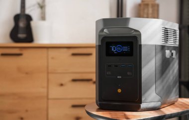 Portable power station on table in living room, closeup