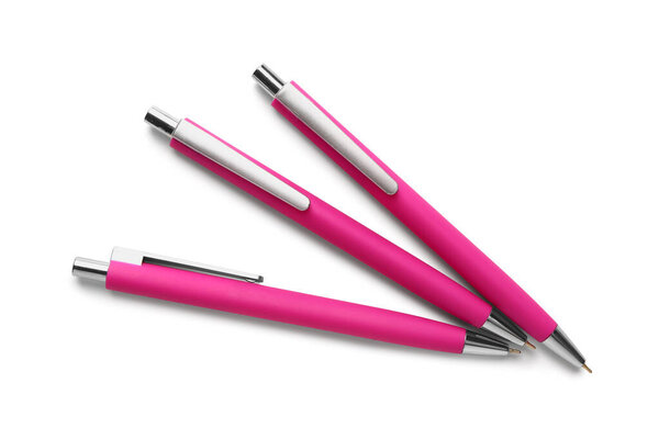 Розовые ручки на белом фоне