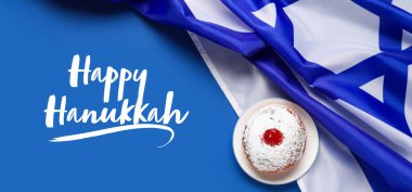 Mavi arka planda İsrail bayrağı ve çörekle Hanuka bayrağını selamlıyorum.