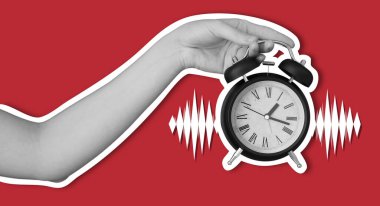 Hand holding alarm clock on red background clipart