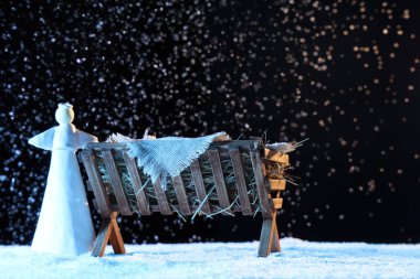 Bebek İsa ve karlı bir yemlik