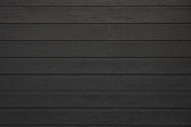 Arkaplan olarak siyah tahta tahtalar, yakın plan