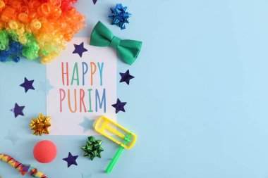 Renk arkaplan üzerinde Mutlu PURIM ve dekor içeren kart