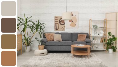 Rahat gri kanepesi ve masası olan bir oturma odası. Farklı renk desenleri