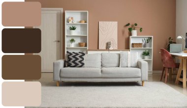 Gri kanepe ve raf üniteleriyle oturma odasının içinde. Farklı renk desenleri