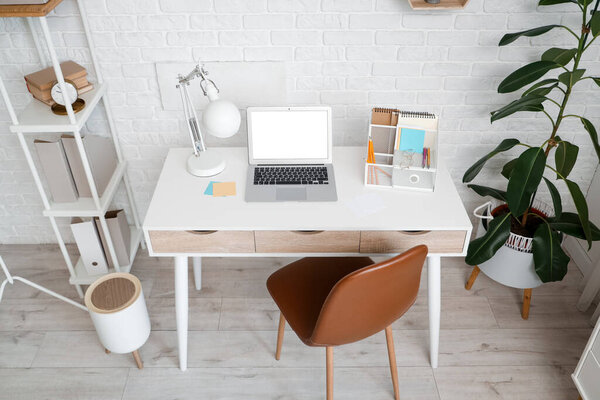 Interior of stylish office with modern workplace