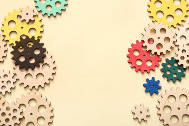 Bej arkaplanda ahşap dişliler