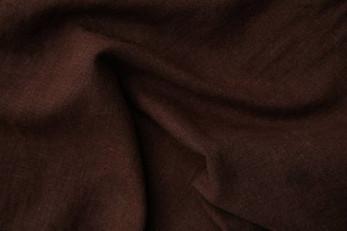 Arkaplan olarak kahverengi masa örtüsü, yakın plan