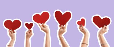 Leylak arka planında kırmızı kalpli çok kişi var. Sevgililer Günü kutlaması