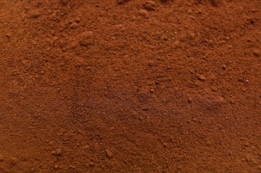 Arka plan olarak kahve tozu yığını, yakın plan.