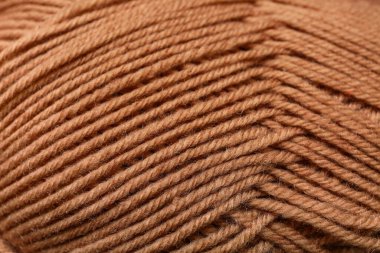 Arkaplan olarak kahverengi örgü ipliği yakın görünümü
