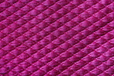 Arkaplan olarak morumsu kumaşın dokusu, yakın plan