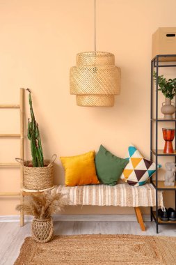Interior of hall with shelving unit and bench