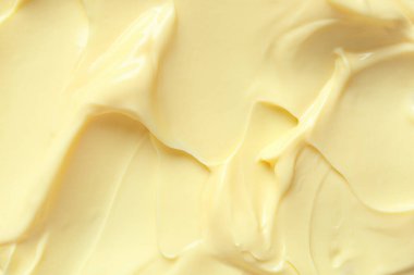 Arka plan olarak lezzetli vanilyalı pudingin dokusu, yakın plan