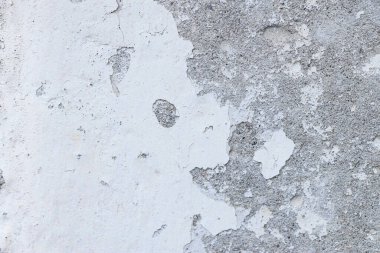 Arka plan olarak eski beyaz alçılı duvar dokusu, yakın plan