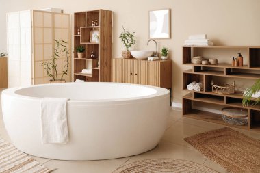 Küvetli, raflı ve lavabolu modern banyo.