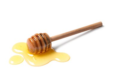 Tatlı bal ve dipper beyaz arka planda izole, yakın plan