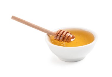 Tatlı bal ve beyaz arka planda ahşap kaplama