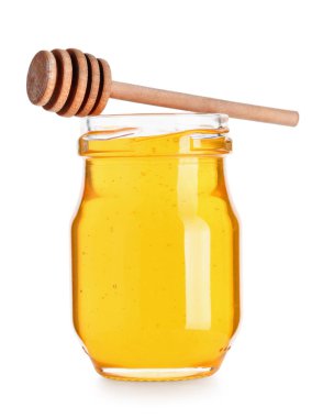 Lezzetli bal kavanozu ve beyaz arka planda izole edilmiş ahşap kaplama.