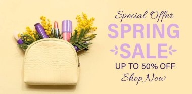 Metin Satış, kozmetik çanta, makyaj kozmetik ürünleri ve mimoza çiçekleri ile pankart