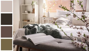 Çiçek açan ağaç dallarıyla aydınlık yatak odasının içi. Farklı renk desenleri