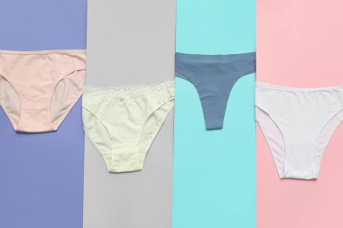 Renkli arka planda farklı kadın külotları.