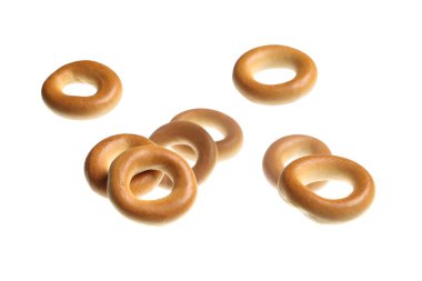 Beyaz arkaplanda uçan simit