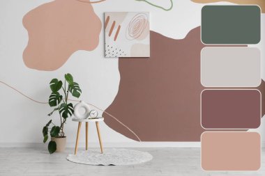 Çiçekli masa, halı ve renkli duvar boyası. Farklı renk desenleri